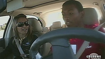 In a driving class, teenager Joseph James attempts to drive and text at the same time. 
