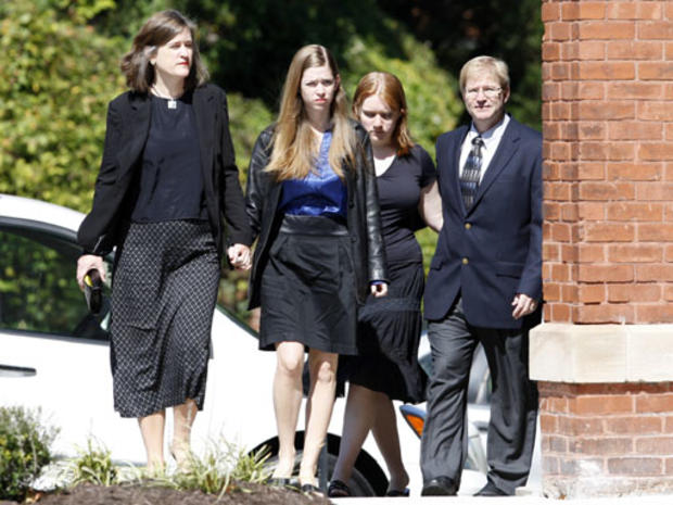 From left, Nancy Wood, of Powhatan, her daughters Caitlin, 18, and Kelly, 16, and their father Jaime Wood attend the funeral service for Debra S. Kelley at Farmville United Methodist Church in Farmville on Saturday, October 3, 2009. The family lived near  