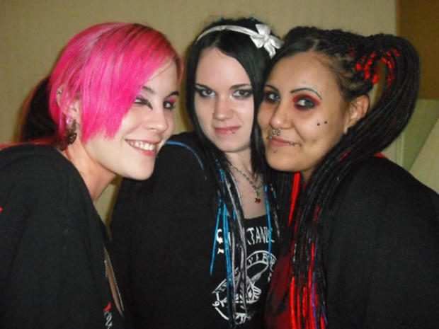 In this Sept. 12, 2009 photo released by Razakel are shown Emma Niederbrock, left, Melanie Wells, center, and Razakel, after a horrorcore festival in Southgate, Mich. Razakel's music brought an alleged killer and his victims together. Richard "Sam" McCros 