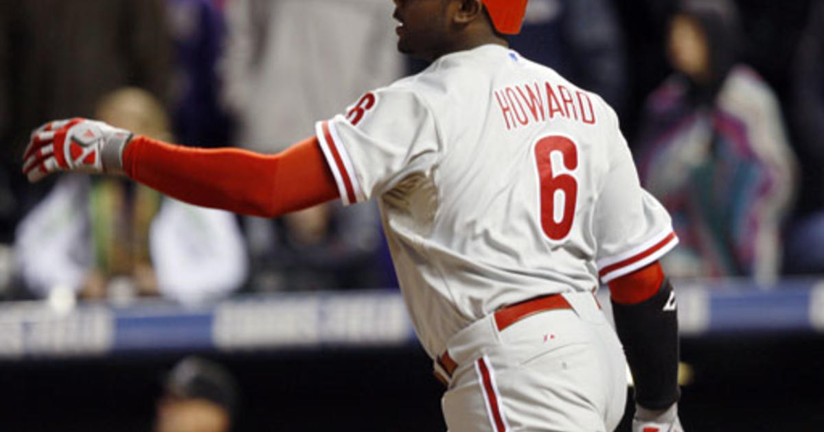 Pitcher Pedro Martinez (L) and catcher Carlos Ruiz walk towards the  Philadelphia Phillies' dugout before their game against the New York  Yankees during game two of the World Series at Yankee Stadium