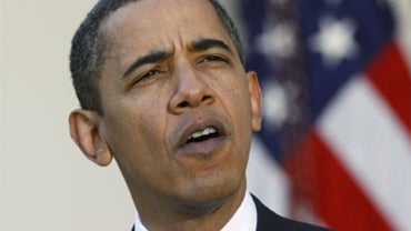 President Barack Obama speaks in the Rose Garden of the White House about health care reform and Iraq's new electoral law after returning from Camp David Sunday, Nov. 8, 2009, in Washington. 