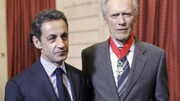 U.S. actor and director Clint Eastwood, right, poses with French President Nicolas Sarkozy, left, after being awarded the "Commandeur de la Legion d'Honneur" (Commander of the Legion of Honor) at the Elysee Palace, in Paris, Friday, Nov. 13, 2009. The cit 