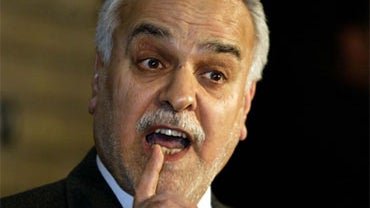 In this Saturday, Feb. 18, 2006 file photo, Iraq's Sunni Arab vice president Tariq al-Hashimi, gestures as he speaks to the press following his meeting with other politicians 