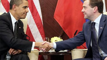 President Barack Obama meets with Russia's President Dmitry Medvedev on the sidelines of the APEC summit in Singapore, Sunday, Nov. 15, 2009. (AP Photo/Pablo Martinez Monsivais) 