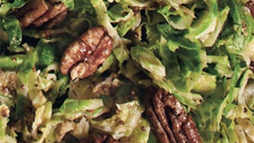 Bon Appetit: Brussels Sprout Slaw with Mustard Dressing and Maple-Glazed Pecans 