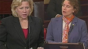 Sen. Mary Landrieu, D-La. (left), and Sen. Blanche Lincoln, D-Ark., speaking in the Senate on November 21, 2009. 