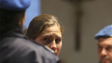 U.S. murder suspect Amanda Knox looks on during a break of the hearing at Perugia's court, Italy, Friday Nov. 20, 2009. 