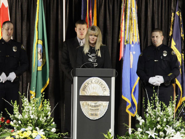 SLIDESHOW - MEMORIAL - This combination of photos provided by the City of Lakewood, Wash., shows, from left to right, Lakewood police officers Greg Richards, 42, Tina Griswold, 40, Ronald Owens, 37, and Sgt. Mark Renninger, 39. The four were killed when a 