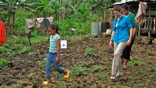 Sei takes Maher through a tour of her village. 