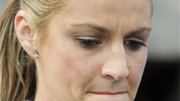 ESPN reporter Erin Andrews talks with reporters after Michael David Barrett, who secretly shot nude videos of Andrews, pleaded guilty to one count of stalking, in federal court in Los Angeles Tuesday, Dec. 15, 2009. 