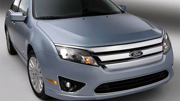This product image relased by Ford whows the 2010 Ford Fusion Hybrid: The Ford Fusion Hybrid combines second-generation hybrid technology, class-leading styling and features along with the class-exclusive SmartGauge with EcoGuide instrument panel to help  