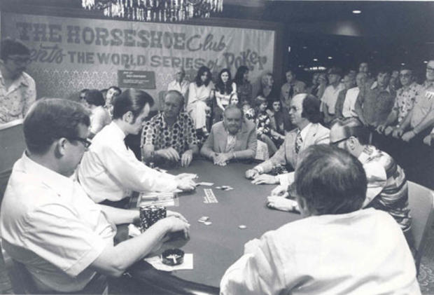 Benny Binion, center, watches a game during one of the early matches of the World Series of Poker tournament. 