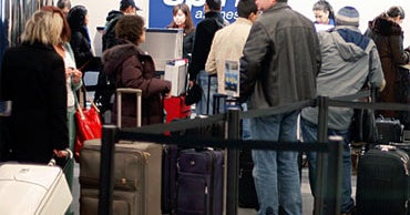 Charging for CarryOn Bags A New Airline Trend? CBS News