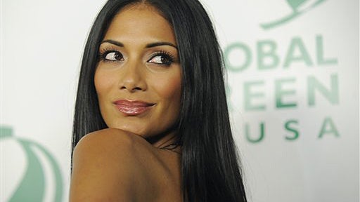 Nicole Scherzinger of the Pussycat Dolls poses at Global Green USA's 7th Annual Pre-Oscar Party in Los Angeles, March 3, 2010. (AP Photo/Chris Pizzello) 