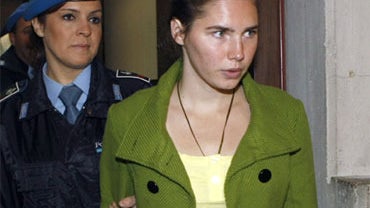 U.S. murder suspect Amanda Knox looks on during a break of the hearing at Perugia's court, Italy, Friday Nov. 20, 2009. 
