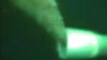 This image provided by the U.S. Coast Guard Saturday April 24, 2010 shows oil leaking from the drill pipe of the Deepwater Horizon drilling rig after it sank Thursday. 