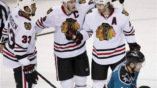 Dustin Byfuglien, Jonathan Toews, Duncan Keith 