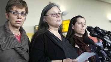 From left, Laura Fattal, Nora Shourd and Cindy Hickey deliver a statement upon their arrival at John F. Kennedy International Airport Saturday, May 22, 2010 in the Queens borough of New York. Fattal, Shourd and Hickey, the mothers of three American hikers 