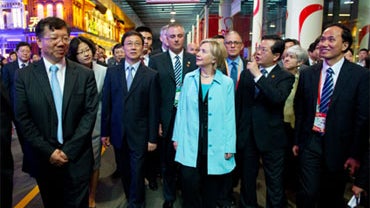 U.S. Secretary of State Hillary Rodham Clinton, center, tours China Pavilion at the World Expo in Shanghai, China, Saturday, May 22, 2010.  