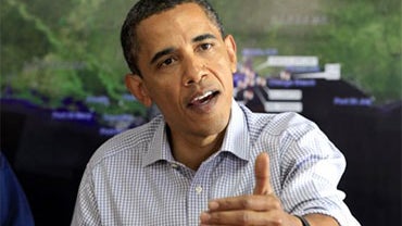 President Barack Obama makes a statement after being briefed on the BP oil spill relief efforts in the Gulf Coast region, Friday, June 4, 2010, at Louis Armstrong International New Orleans Airport in Kenner, La. (AP Photo/Charles Dharapak) 