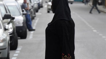 A woman wearing a veil is seen in Lleida, Spain, Friday, May 28, 2010. 