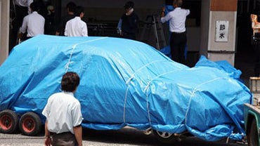 Mazda Worker Rams Car into Employees 