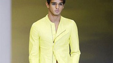 A model wears a creation of Giorgio Armani men's Spring-Summer 2011 collection, part of the Milan Fashion Week, unveiled in Milan, Italy, Tuesday, June 22, 2010. (AP Photo/Antonio Calanni) 