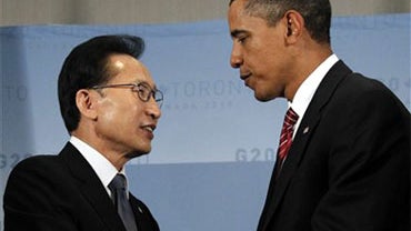 President Barack Obama shakes hands with President Lee Myung-bak of South Korea, left, at the end of their meeting on the sidelines of the G20 summit in Toronto, Saturday, June 26, 2010. (AP Photo/Charles Dharapak) 
