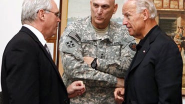 U.S. Vice President Joe Biden, right, Gen. Ray Odierno, center, and U.S. Ambassador to Iraq Christopher Hill, left, confer at the embassy in Baghdad, Iraq, Saturday, July 3, 2010. Vice President Joe Biden landed Saturday in Baghdad to coax Iraqi leaders i 