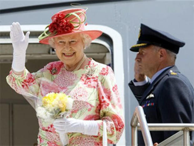 Queen Elizabeth waves goodbye as she boards her plane heading to New York at Pearson International Airport in Toronto Tuesday, July 6, 2010. (AP Photo/Darren Calabrese, The Canadian Press) 
