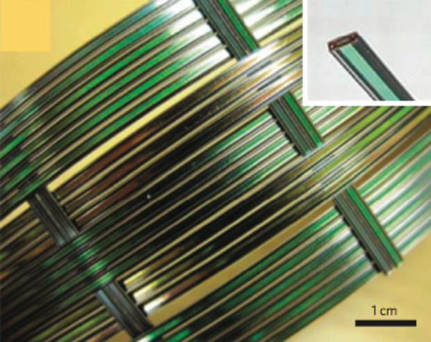 A sample of the MIT piezoelectric fibers that shows their dimensions. 