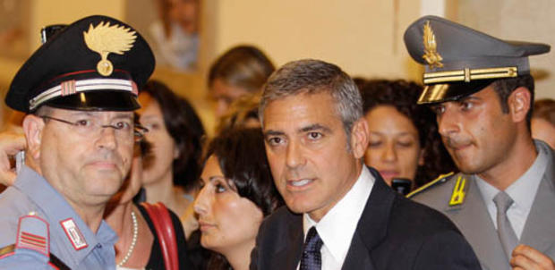George Clooney leaves the tribunal in Milan, Italy, Friday, July 16, 2010. Clooney appeared in court as a witness in a fraud trial against defendants charged with co-opting his name for a line of clothing. (AP Photo/Luca Bruno) 