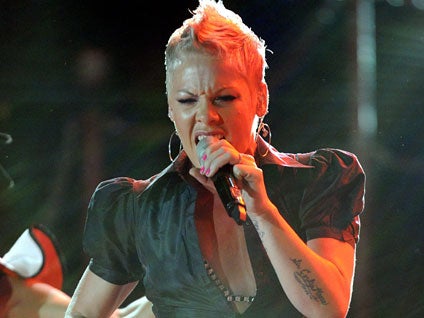 Pink Taken to Hospital After Onstage Fall - CBS News