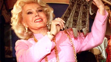 In this April 11, 1999, file photo, actress Zsa Zsa Gabor is seen holding a beaded purse once owned by actress Marilyn Monroe. 