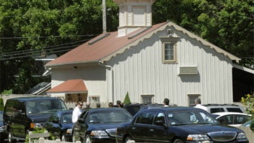Limousines start to line up outside a hotel in the town of Rhinebeck, New York as crowds start to gather on the day of Chelsea Clinton's multimillion-dollar wedding in the tiny town of Rhinebeck, about 100 miles north of New York City. 