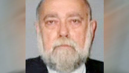 Posed portrait of a young woman is seen as police struggle to deal with sex trafficking. 