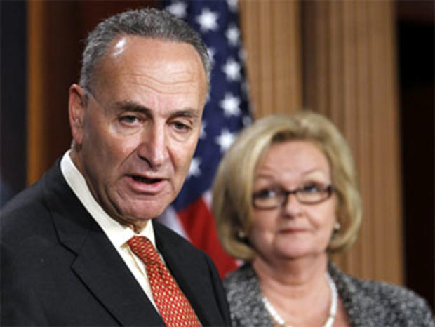 Sen. Charles Schumer, D-N.Y., left, and Sen. Claire McCaskill, D-Mo., talk about immigration and border security during a news conference in Washington, Aug. 5, 2010. The Senate has approved $600 million to beef up security at the U.S.-Mexico border. 