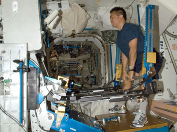 Astronaut using ARED 