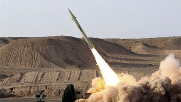 This photo released on Wednesday, Aug. 25, 2010, by the Iranian Defense Ministry, claims to show the launch of the Fateh-110 short-range surface-to-surface missile by Iranian armed forces, at an undisclosed location. 