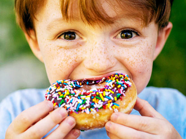 overeat-kid-doughnut-512_1.jpg 