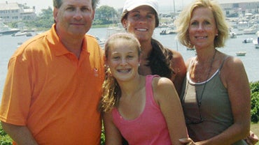 Dr. William Petit Jr., left, with his daughters Michaela, front, Hayley, center rear, and his wife, Jennifer Hawke-Petit 