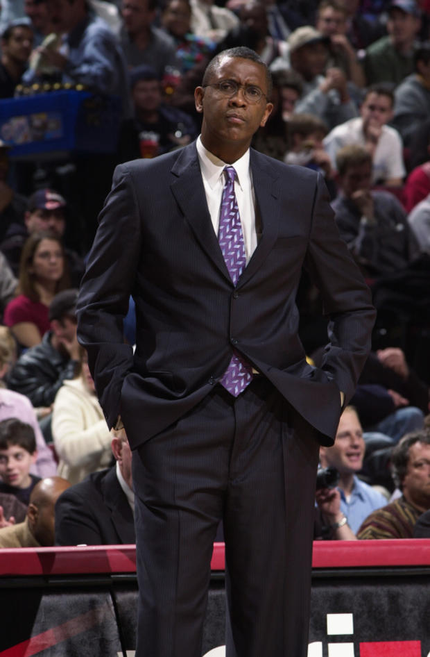 Coach Bill Cartwright oversees the action from the sidelines 