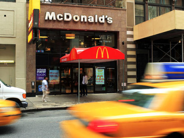 Taxis drive past a McDonald's restaurant on September 9, 2010, in New York City. 