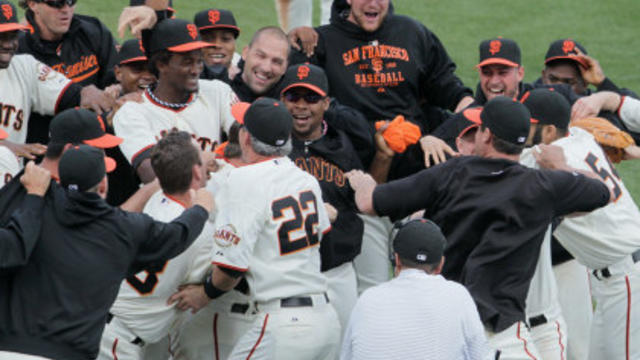 SF Giants pop champagne after NL playoffs clincher over Padres