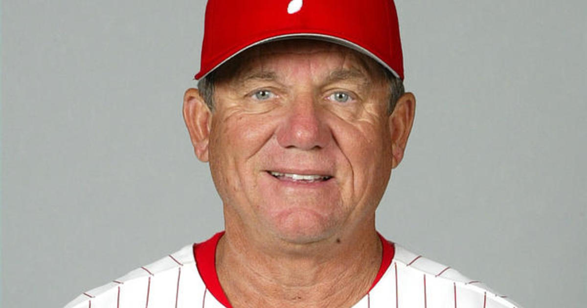 Former Philadelphia Phillies' manager Larry Bowa coaches third