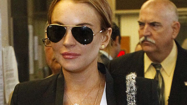 Lindsay Lohan leaves the Beverly Hills courthouse after attending a probation violation hearing for failing a drug test on Oct. 22, 2010, in Beverly Hills, Calif.  