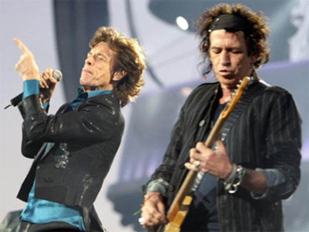 Mick Jagger and Keith Richards of the Rolling Stones perform on the stage at the Olympic Stadium during a concert in Lausanne, August 11, 2007. 