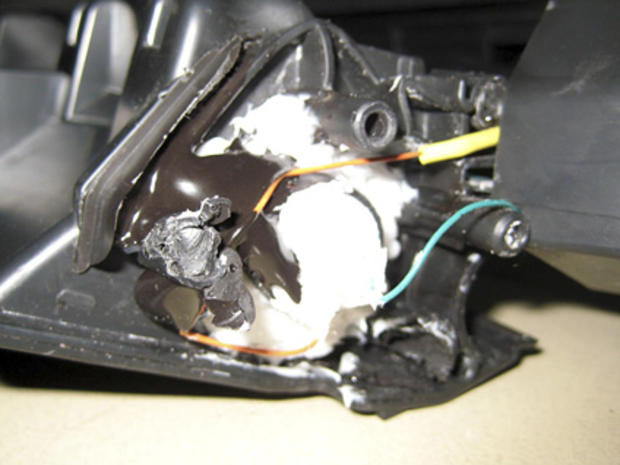 This undated photo claims to show parts of a computer printer with explosives loaded into its toner cartridge found in a package onboard a cargo plane coming from Yemen, in Dubai, United Arab Emirates.  