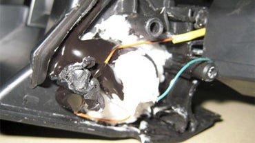 This undated photo claims to show parts of a computer printer with explosives loaded into its toner cartridge found in a package onboard a cargo plane coming from Yemen, in Dubai, United Arab Emirates. 
