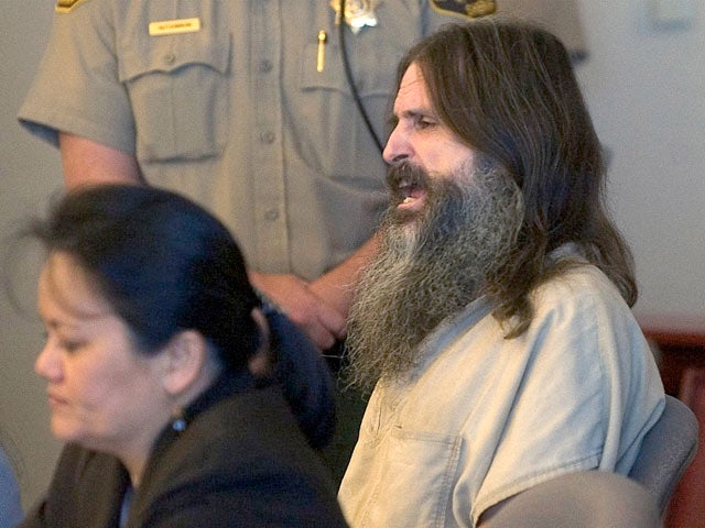 Brian David Mitchell sits with lawyer Vernice Trease, left, in Judge Judith Atherton's courtroom for his competency hearing Tuesday, May 24, 2005, in Salt Lake City. 